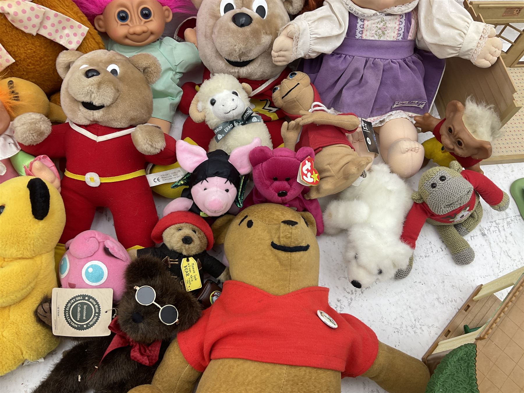 Quantity of stuffed toys and dolls to include Teddy Ruxpin, Cabbage Patch, Troll doll, and a quantity of plastic toys including Sylvanian Families Country School etc, in two boxes