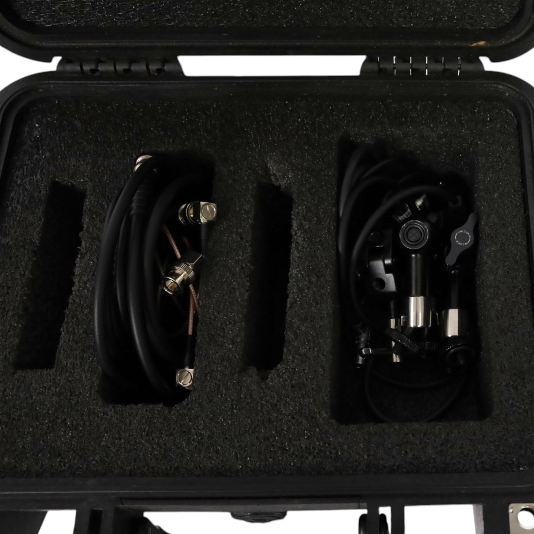 Paralinx Ace wireless transmitter and receiver set, with two SmallRig magic arms, associated cables including four D-tap to two-pin lemo cables, two short and one long SDI cables and SmallRig clamp, contained within Peli 1400 case