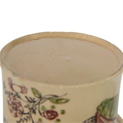 Late 18th century creamware documentary tankard, of cylindrical form with curbed handle, inscribed 'John & Dorothy Stockel 1783', above a floral spray and flanked by a seated female figure to one side, and bull and house to the other, H16.5cm