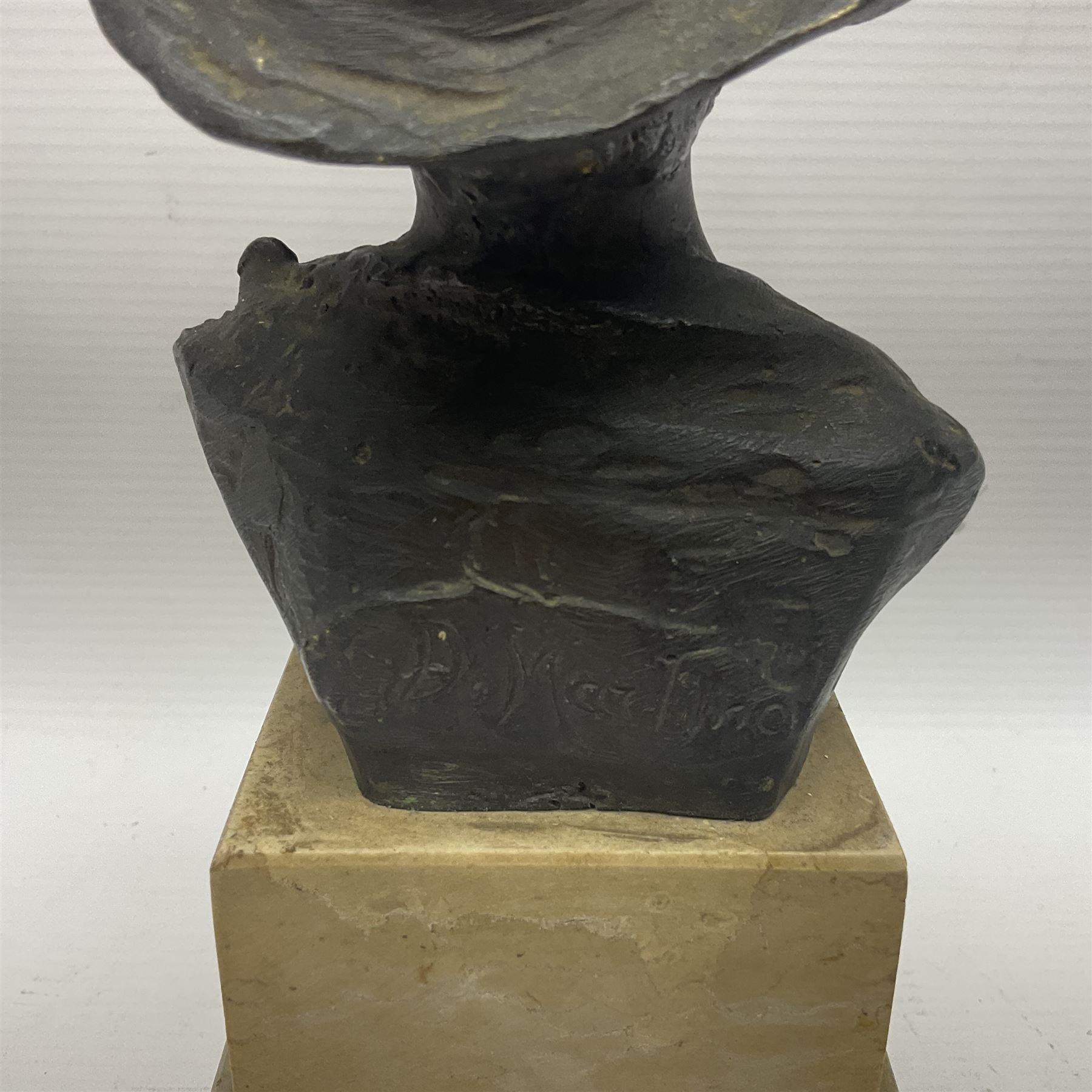 After Giovanni De Martino (1870-1935); bronzed bust of a boy on square marble plinth, H23cm