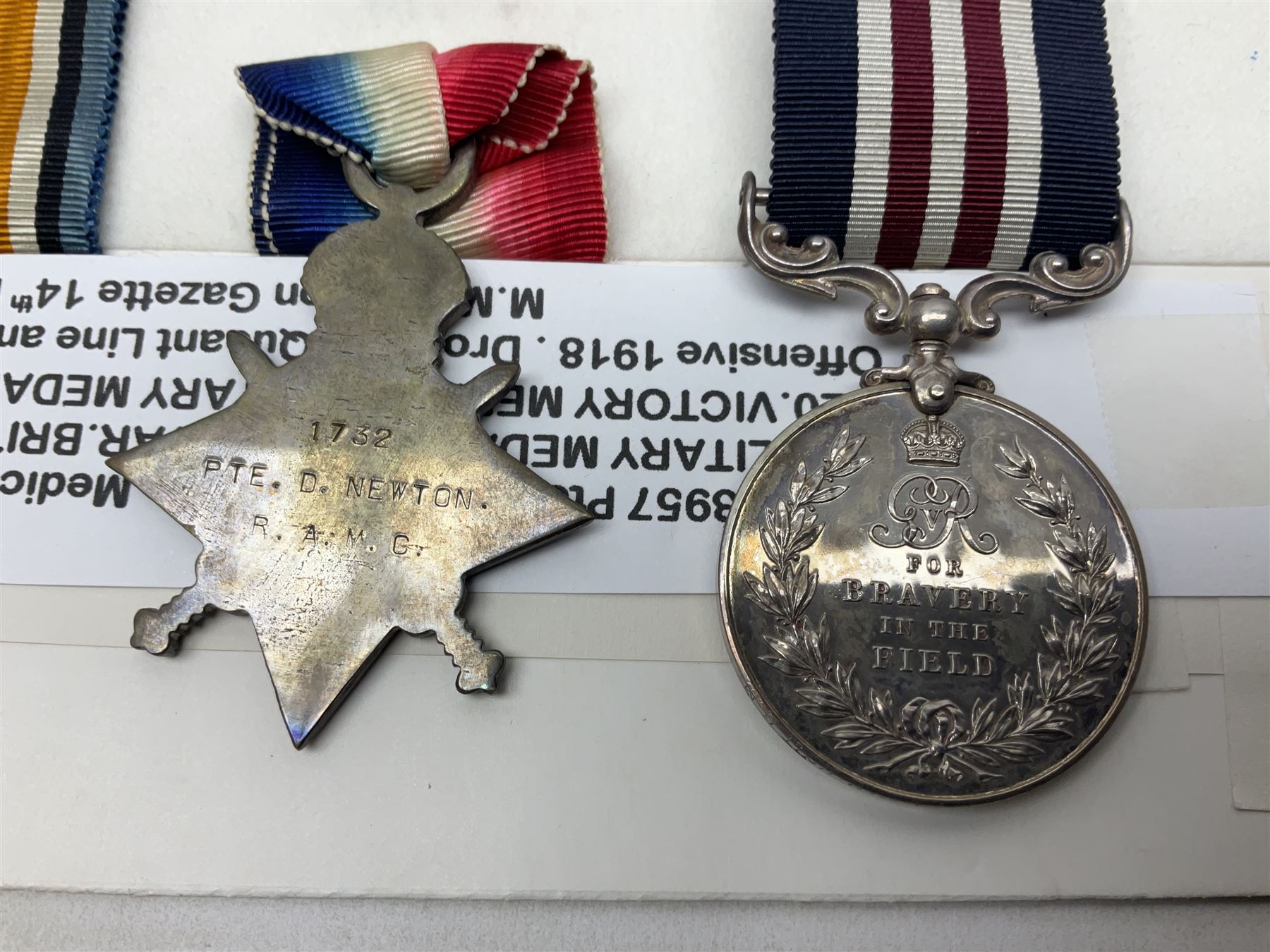 WWI Military Medal awarded to S-3957 Pte. W. Wood Med. Unit R.M. as reported in the London Gazette 14th May 1919 for services at 'the British Offensive 1918 Drocort-Queant Line and subsequent Operations' with archive of research information and original bill of purchase from Spink & Son dated 5/9/1957; together with a WWI group of three medals comprising British War Medal, Victory Medal and 1914-15 Star awarded to 1732 Pte. D. Newton R.A.M.C.