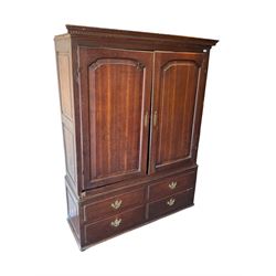 George III oak press cupboard, dentil cornice over two arch fielded panel doors, the base fitted with four drawers with pressed brass handle plates