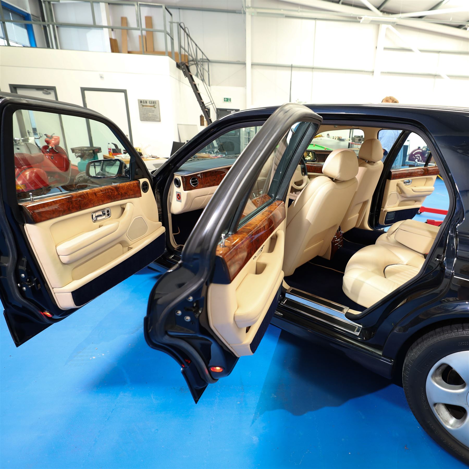 2001 Bentley Arnage Red Label Saloon

Registration: BU51 TGX
Engine: 6.75-litre turbocharged V8 petrol
Transmission: Automatic
Odometer reading: 39,942 miles
Colour: Black Sapphire metallic
Interior: Magnolia leather with burr walnut veneers
Previous owners: 3
V5C: Present
Service history: Good service records

An exceptional Bentley Arnage Red Label Saloon, finished in Black Sapphire metallic, a very dark blue, with a Magnolia leather interior, contrasting dark blue carpets and extensive burr walnut veneers. The car displays an odometer reading of approximately 39,942 miles.

The Arnage Red Label combined Bentley’s renowned 6.75-litre turbocharged V8 engine with automatic transmission, delivering effortless performance in a traditionally appointed luxury saloon. The model is distinguished by its imposing proportions, characteristic Bentley radiator grille and finely crafted interior.

Presented in excellent condition throughout, the bodywork and metallic paint finish appear particularly well preserved, complemented by clean brightwork and the correct Bentley alloy wheels. The engine bay is also notably well detailed.

The interior presents exceptionally well, retaining its Magnolia leather upholstery, polished burr walnut veneers, original factory instrumentation and switchgear. The leather displays only light creasing consistent with careful use.

The car has had three previous owners and is accompanied by good service records.

Features

• 6.75-litre turbocharged V8 petrol engine
• Automatic transmission
• Black Sapphire metallic paintwork
• Magnolia leather interior
• Contrasting dark blue carpets
• Burr walnut veneers
• Electrically adjustable front seats
• Air conditioning
• Factory instrumentation and switchgear
• Bentley alloy wheels
• Right-hand drive
• Odometer reading of approximately 39,942 miles
• Three previous owners
• Good service records
• V5C present

This vehicle forms part of the Estate of the Late John Sills and is offered for sale by the Executors, confirming a genuine reason for sale.