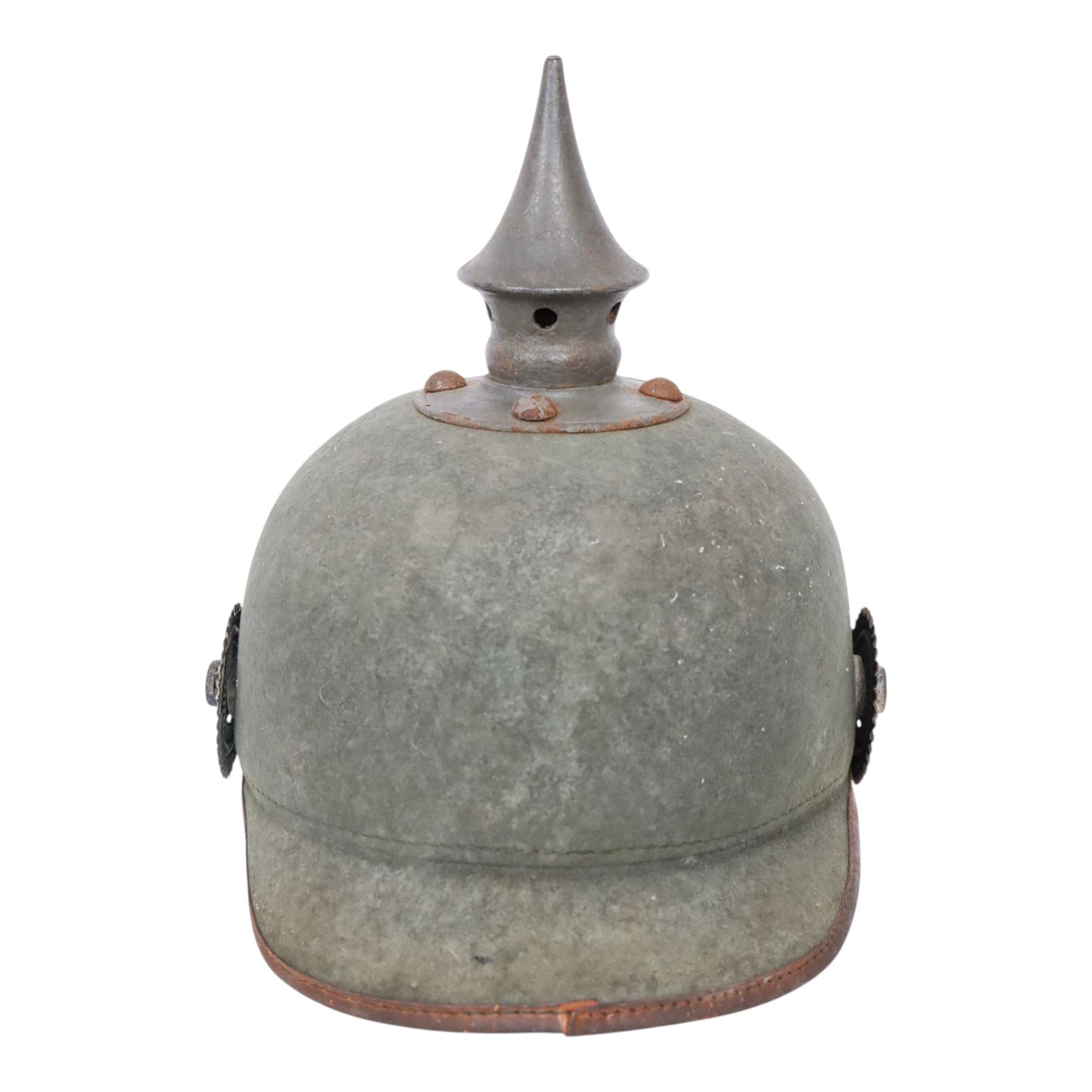 WWI Prussian 22nd regiment Ersatz Felt Pickelhaube, the grey felt skull with steel spike finial, 22 helmet plate and leather chin strap, one side with a black cockade, the other black and red,  the inner back brim stencilled BA 1X Wm Kleddinghaus & C, Elberfeld, 1916, H24cm