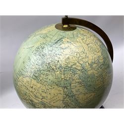 Terrestrial globe by Grinell, Washington, mounted on a brass half meridian and raised on turned wood pedestal base, H55cm
