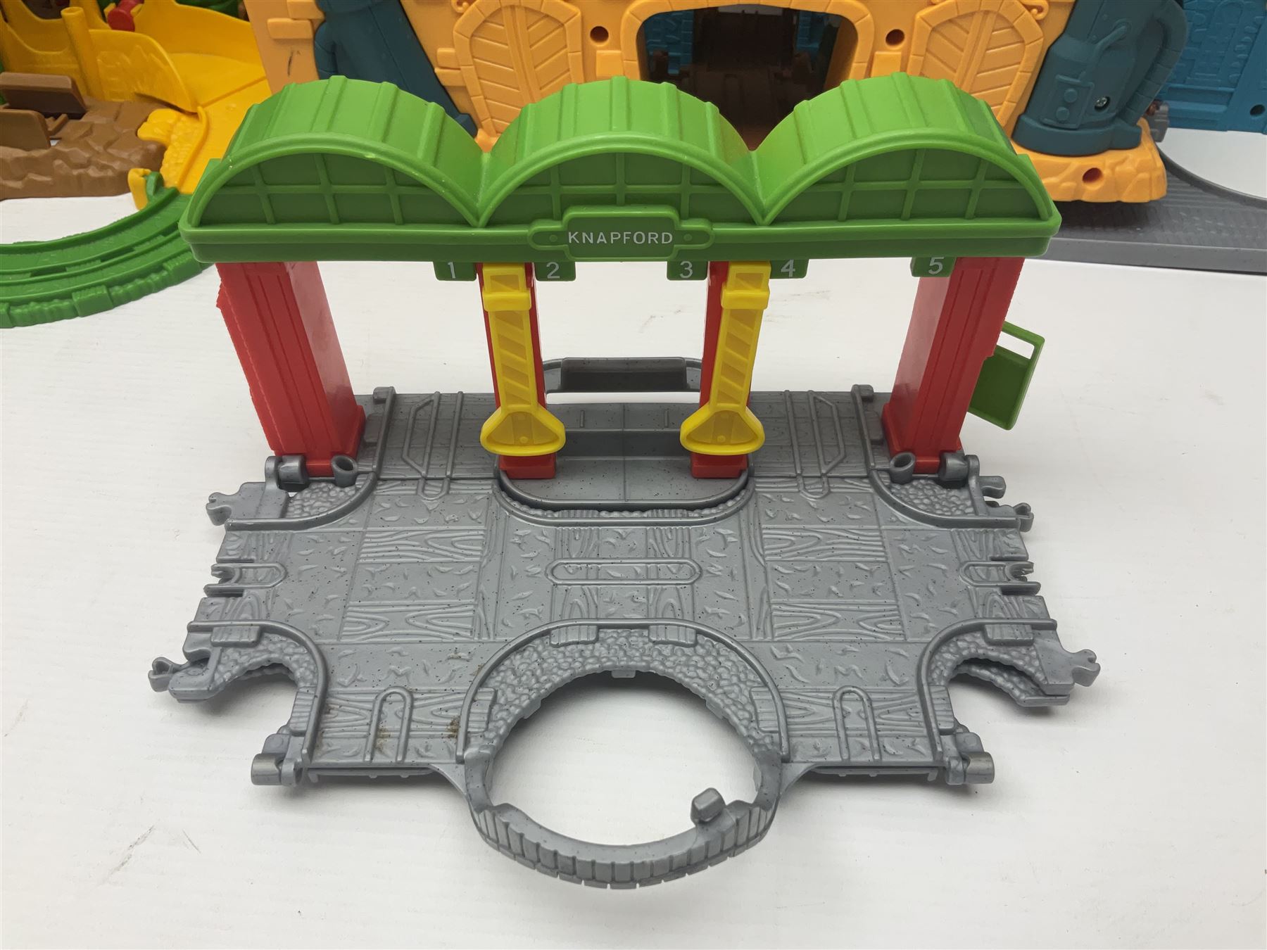 Quantity of Thomas the Tank Engine playsets and track, and Thunderbirds 2004 Tracy Island playset with some associated vehicles, in two boxes 