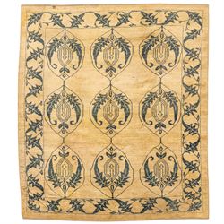 Late 20th century Turkish hand-woven carpet, golden beige field decorated with a repeating...