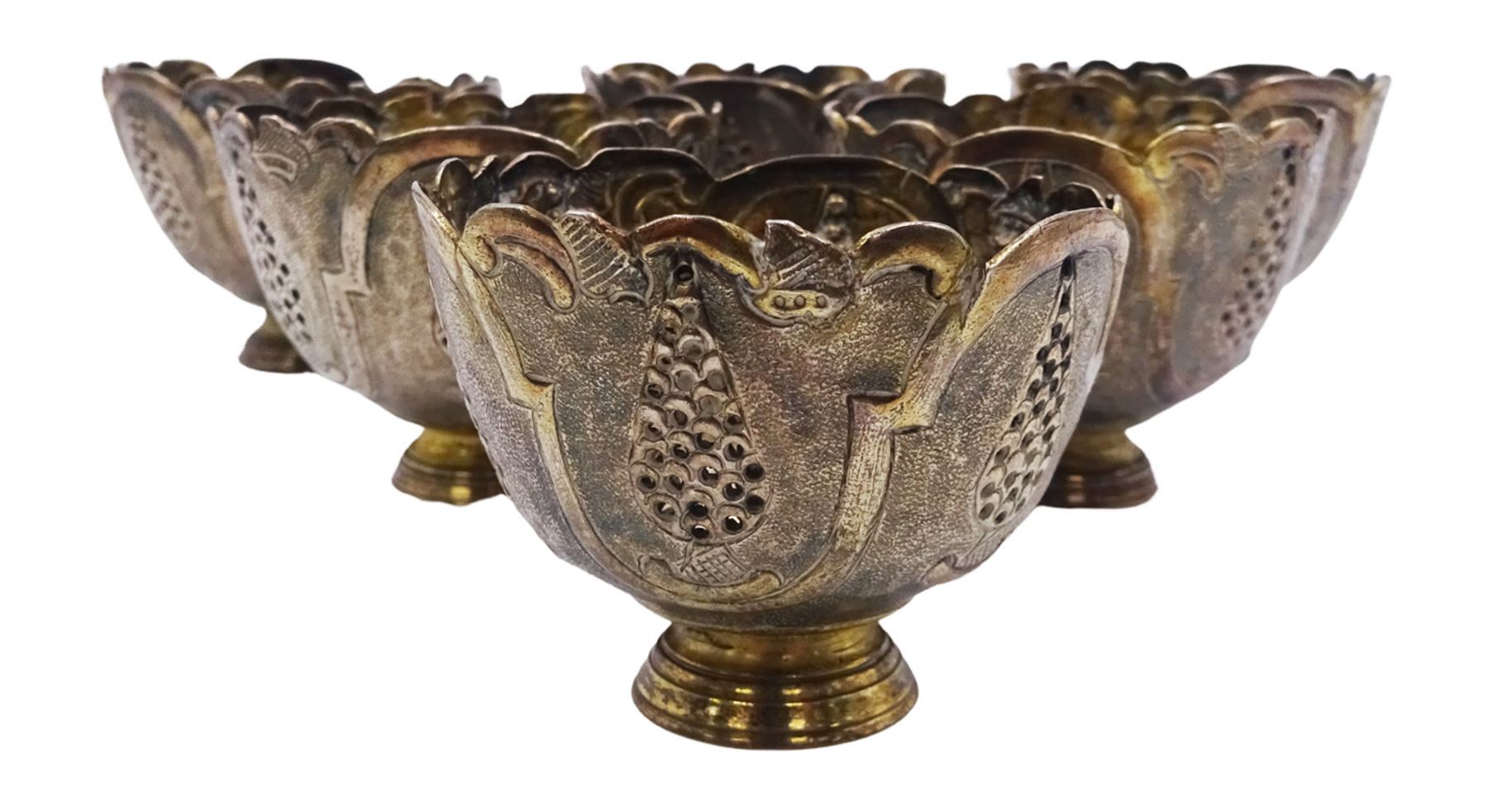 Set of six Ottoman Turkish silver zarfs or coffee cup holders, probably 19th century, the bowls with shaped rims and embossed and pierced decoration, upon stepped circular feet, D6cm H5cm