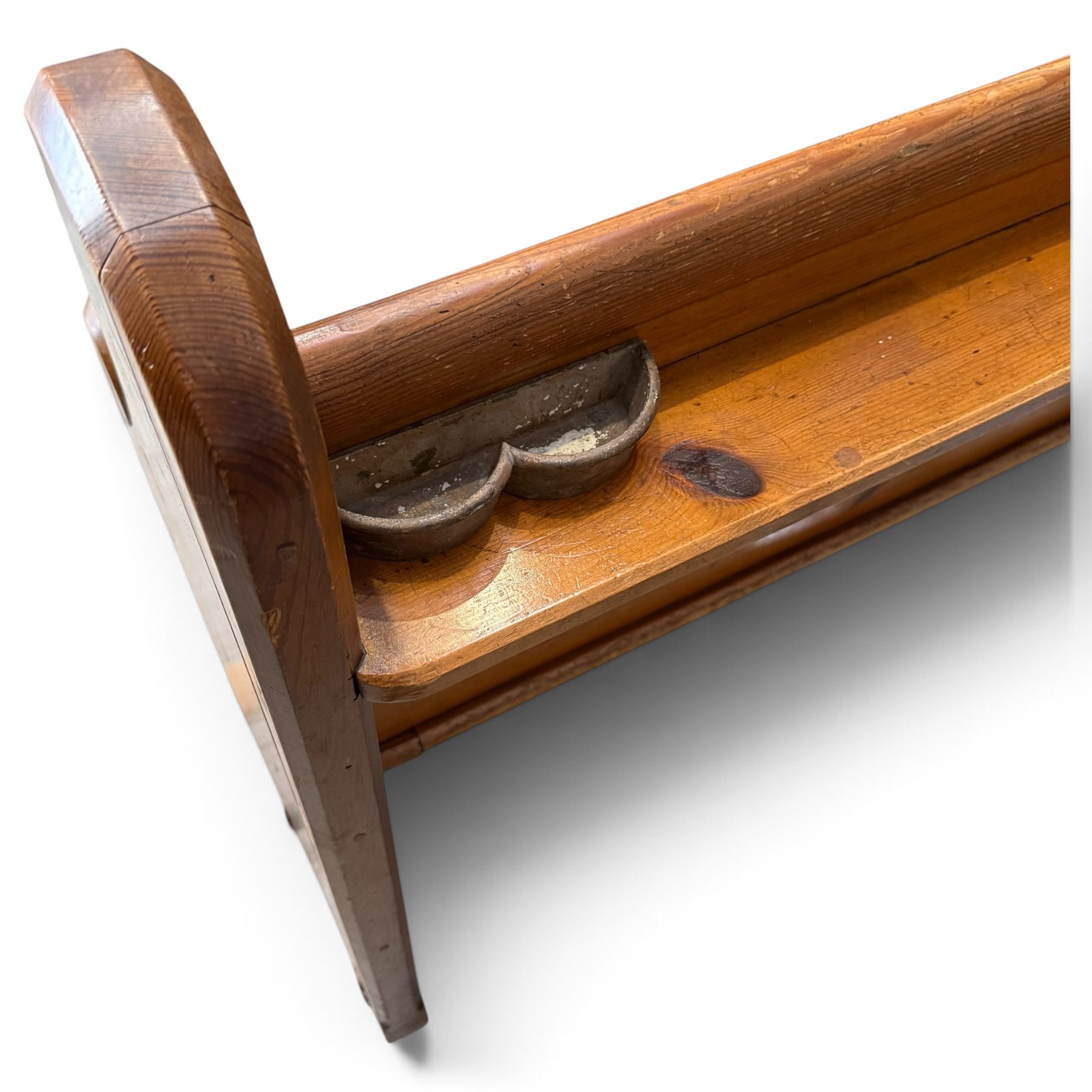 Early 20th century stained pine ecclesiastical church pew, the shaped end supports flanking slatted and panelled back, with black stencilled number '17' to the side