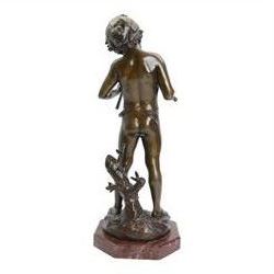 After Auguste Moreau (French 1834-1917): Large Bronze Figure of a Young Boy Playing the Aulos (Double-Reeded Pipes) standing upon a naturalistically modelled base detailed with tree stump and further pipe, signed Aug Moreau, upon octagonal red marble base, H73cm