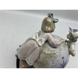 Lladro figure, Voyage of Columbus, modelled as children climbing on a globe, limited edition 6822/7500, sculpted by Francisco Polope, with original box, no 5847, year issued 1992, year retired 1993, H24cm