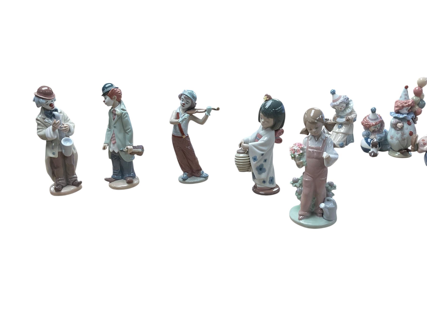 Five Lladro figures, including 5471, 5472, 5217 etc