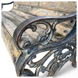 Late 19th/early 20th century Coalbrookdale design cast iron and teak garden bench, the end supports with scrolled backs and pierced foliate arm terminals above ornate scrolling acanthus-cast stretchers, terminating in lobed pad feet, united by a teak slatted back and seat
