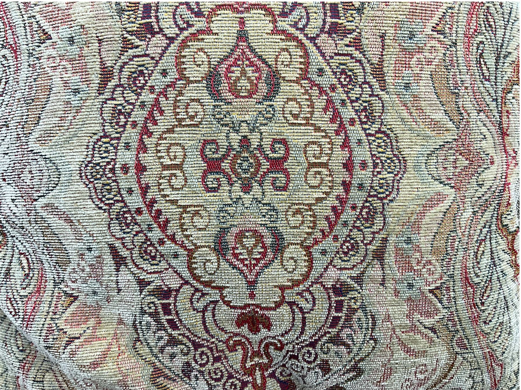 Parker Knoll two seat sofa, upholstered in natural beige patterned fabric