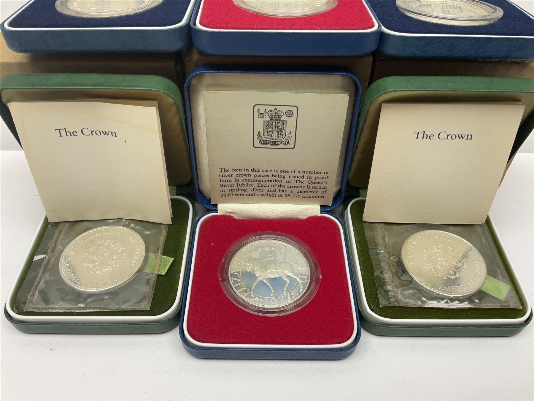 Six Queen Elizabeth II United Kingdom silver crown coins, comprising two 1972 'Silver Wedding', two 1977 'Silver Jubilee' and two 1981 'Commemorating The Marriage of His Royal Highness The Prince of Wales and Lady Diana Spencer', all cased with certificates 