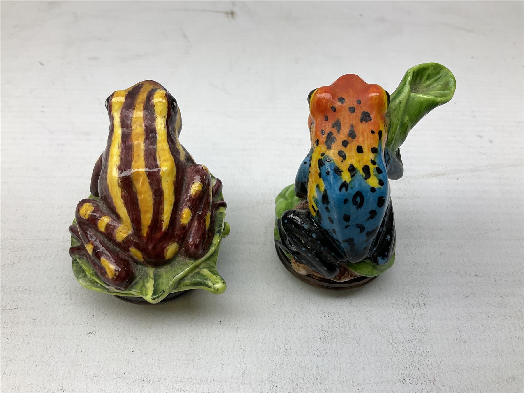 Four Halcyon Days bonbonnieres modelled as frogs, Golden Toad, Red-eyed frog, Dart-poison frog, and Poison Dart frog, in single box 