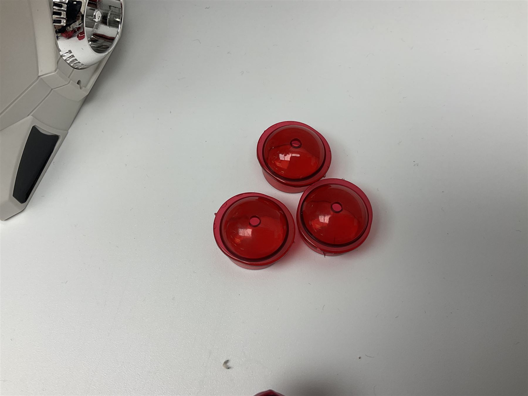 Collection of early 90s Mighty Morphin’ Power Rangers Zords, figures and accessories. Titanus the Carrier Zord, marked Bandai 1991; Green Dragonzord, incomplete; 1994 White Tigerzord with original instruction manual; 1993 Triceratops Dinozord, Mastodon Dinozord and Sabertooth Tiger Dinozord, Pterodactyl Dinozord, missing guns; with 1993 Power Morpher and original Power Coins, with further related figures, accessories and weapons