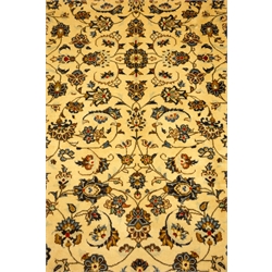  Kashan beige ground rug, floral and foliate field, repeating border, 355cm x 250cm  