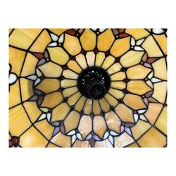 Collection of Tiffany-style light shades, to include six bowl-shaped wall-mounted fittings with floral and berry motifs and three ceiling-mounted light shades