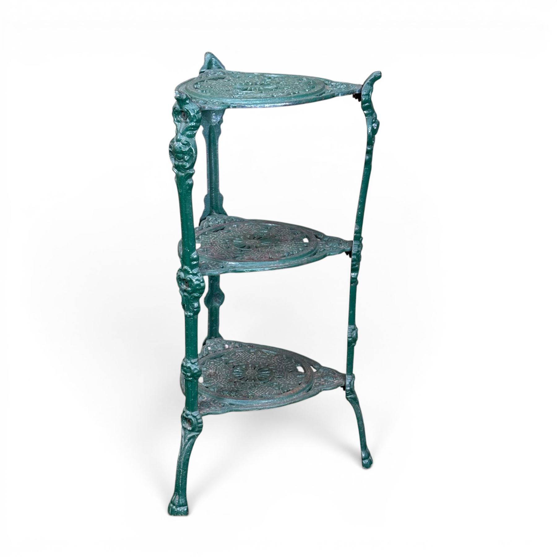 Ornate cast iron three tier garden plant or pan stand, green painted finish