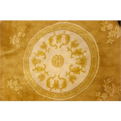  Chinese washed woollen gold ground carpet, decorated with tailing foliage. centre shou motif, 363cm x 267cm  