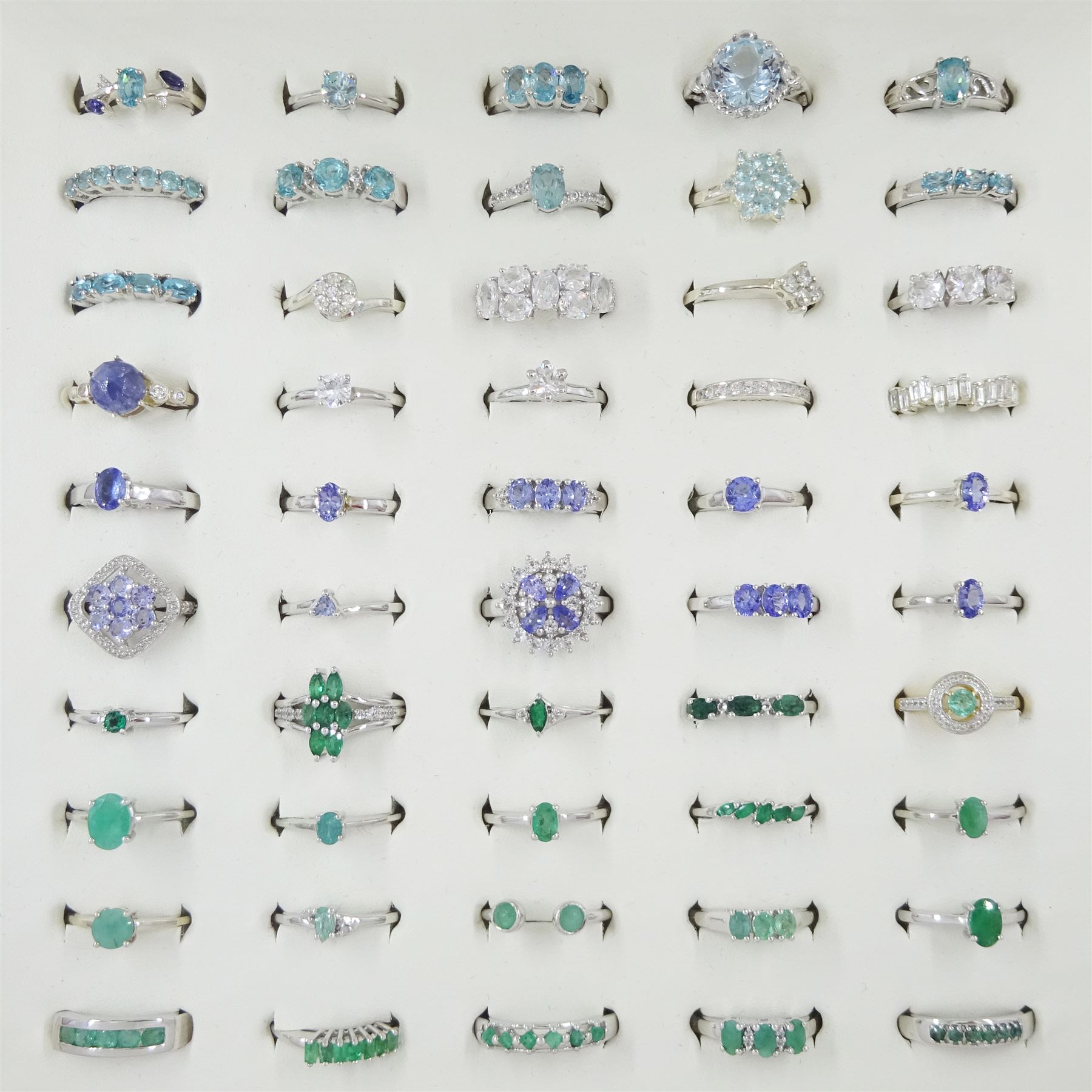 Fifty silver stone set rings including tanzanite, apatite, zircon and topaz