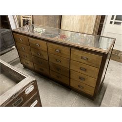 20th century oak and glazed haberdashery shop’s cabinet, glass front and sides, fitted with sixteen graduating drawers  - THIS LOT IS TO BE COLLECTED BY APPOINTMENT FROM THE OLD BUFFER DEPOT, MELBOURNE PLACE, SOWERBY, THIRSK, YO7 1QY