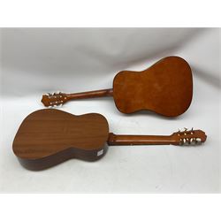 Two children guitars, comprising of Herald acoustic guitar model HL34 and Spanish BM Clasico semi acoustic guitar, largest example H100cm