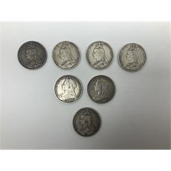 Eleven Great British crown coins, three King George III all with heavily rubbed dates, seven Queen Victoria dated four 1889, 1891, two 1896 and a King Edward VII 1902 crown