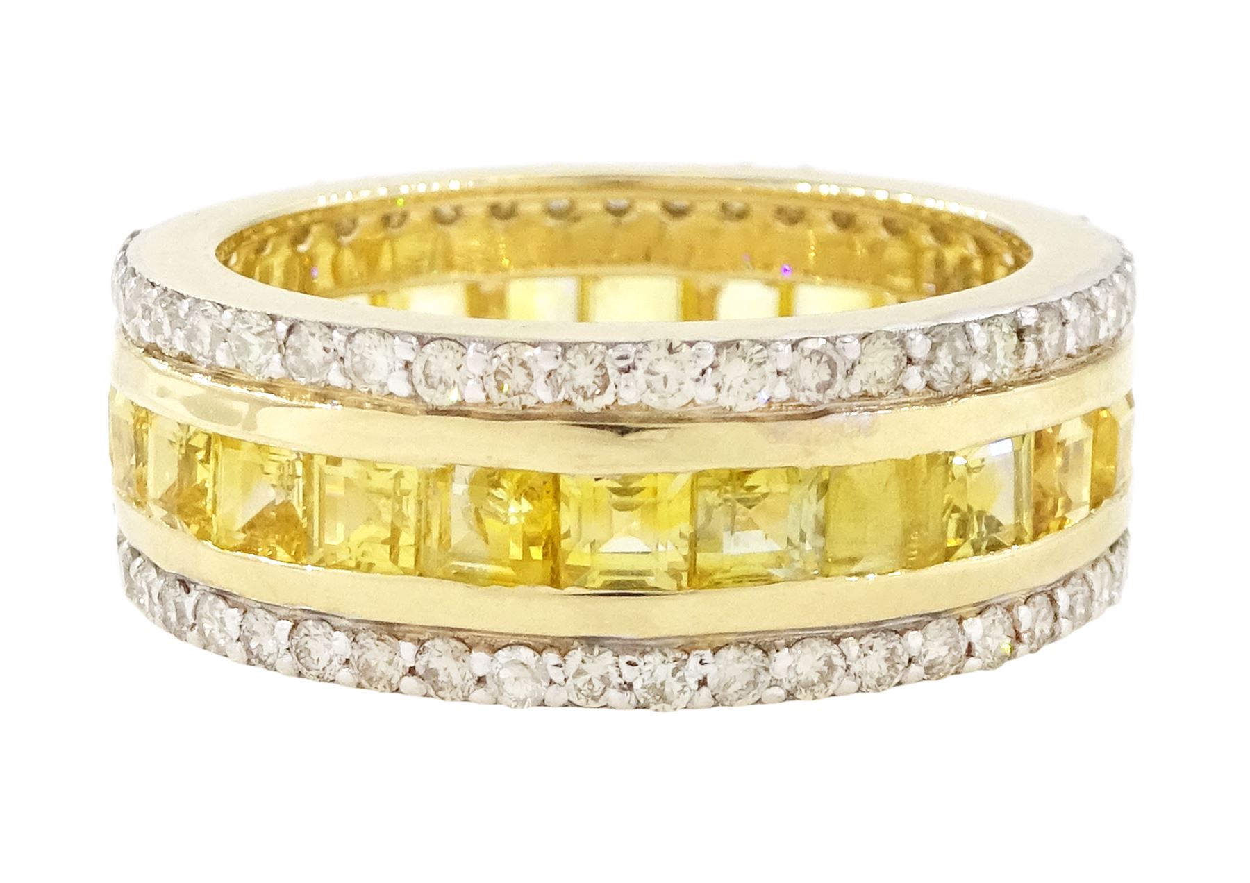 Gold yellow sapphire and diamond three row full eternity ring, channel set calibre cut sapphires, with a row of round brilliant cut diamonds set either side, stamped 9K, total sapphire weight approx 2.95 carat, total diamond weight 0.85 carat