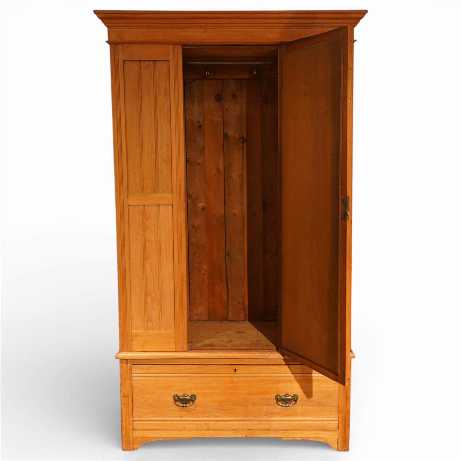 Edwardian ash single wardrobe, the moulded cornice above a single mirrored  hanging interior, flanked by panelled sections with drawer below, raised on bracket feet