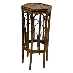 Late 19th century black-painted cane seat chair; early 20th century radial spindle-back chair with green upholstery; early 20th century mahogany single-drawer side table; mid-20th century carved wooden stool with harp motif; early 20th century hexagonal bamboo stand; two oval mirrors (7)