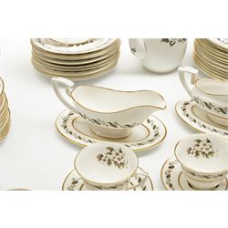 Extensive Royal Worcester Bernina pattern table service comprising thirteen dinner plates, twelve dessert plates, nine two handled soup bowls and stands, twelve side plates, three vegetable dishes and covers, pair of sauce boats and stands, two graduated oval meat plates, eleven tea cups, fourteen saucers, sixteen tea plates, coffee pot and eight coffee cups and saucers, (113 pieces) 