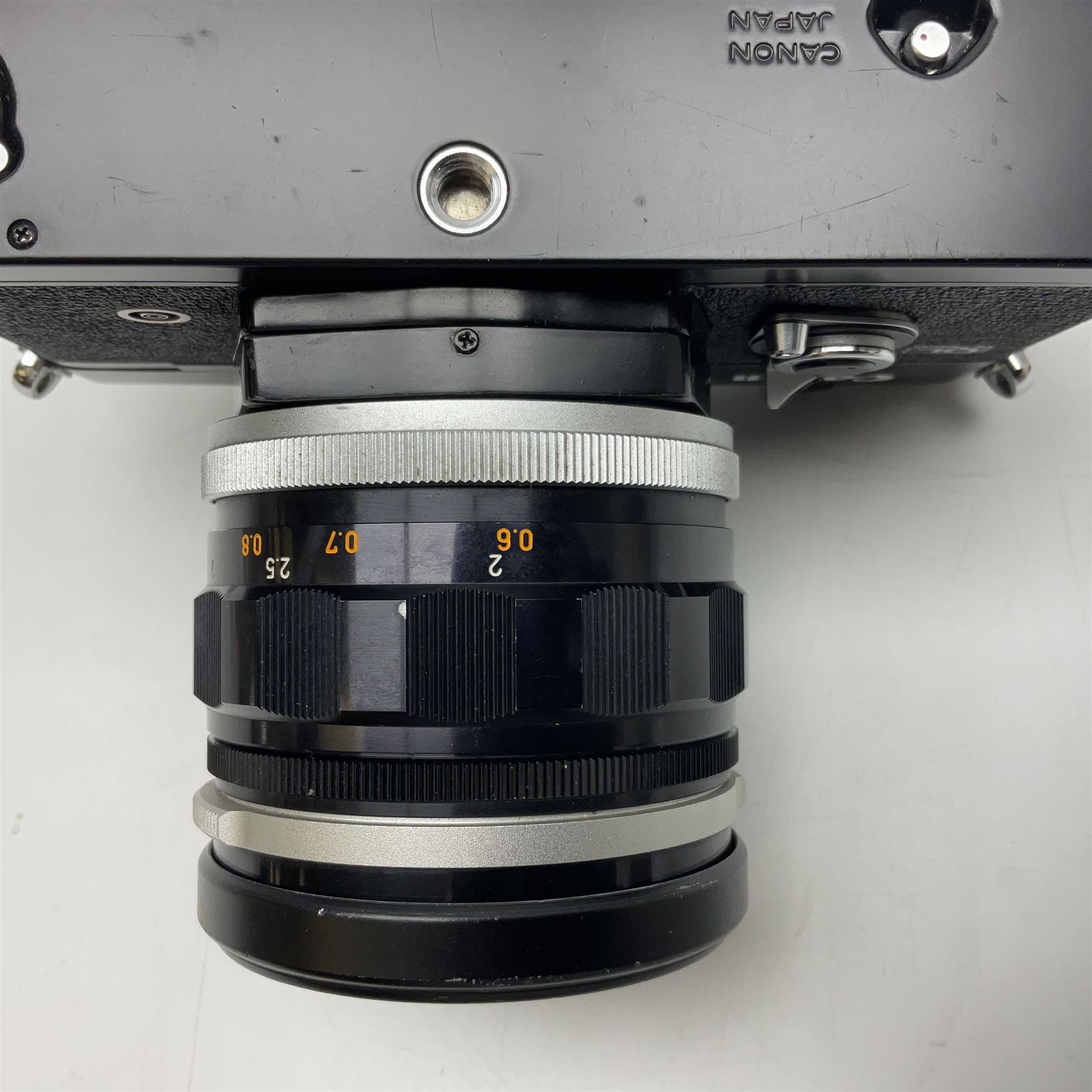 Canon QL Pellix camera body, serial no. 807468, with 'Canon FL 58mm 1:1.2' lens, serial no. 60185