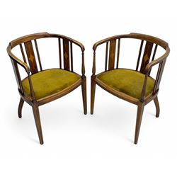 Pair of early 20th century Edwardian inlaid mahogany elbow chairs, shaped top rails with central diamond motif and line inlays, flanked by turned uprights, green velvet seats, on square tapered legs