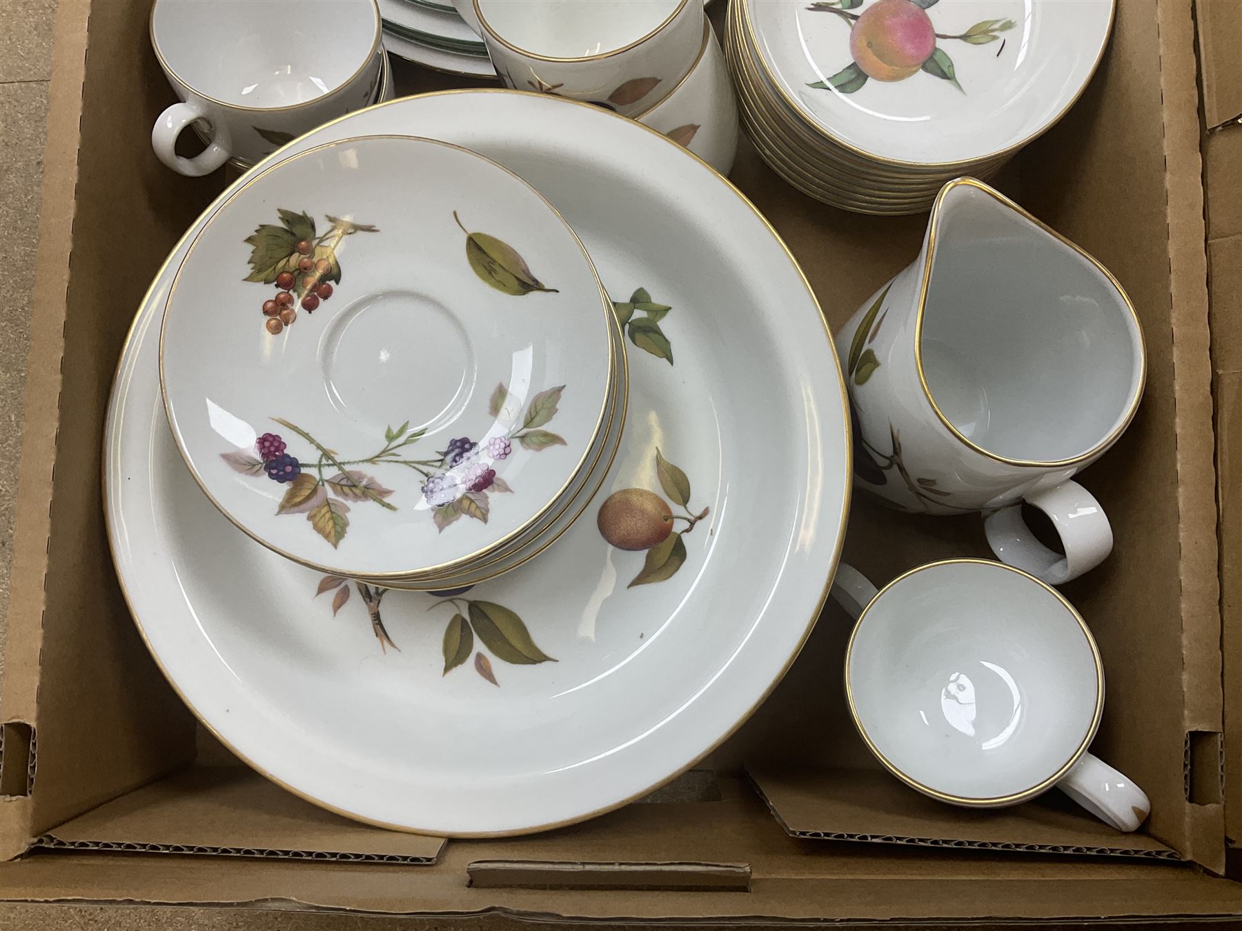 Royal Worcester Evesham and Evesham Vale tea and dinner wares, to include, three large covered tureens, coffee pot, eight tea cups and saucers, milk jug, two covered sucriers, boxed serving spoons etc, approx .130