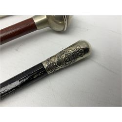 Three military swagger sticks - 14th Foot West Riding POWO Regiment; Northern Cyclist Battalion; both with regimental crests; and another with spherical terminal inscribed L/Cpl. Boycott P.M. WC. C.C.F. 7th Dec. 1960 (Combined Cadet Force?); all with plated mounts (3)