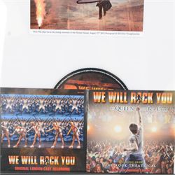 Signed photograph of Brian May playing at the 2012 Olympic Closing Ceremony, framed with Queen We Will Rock You The Musical sleeve