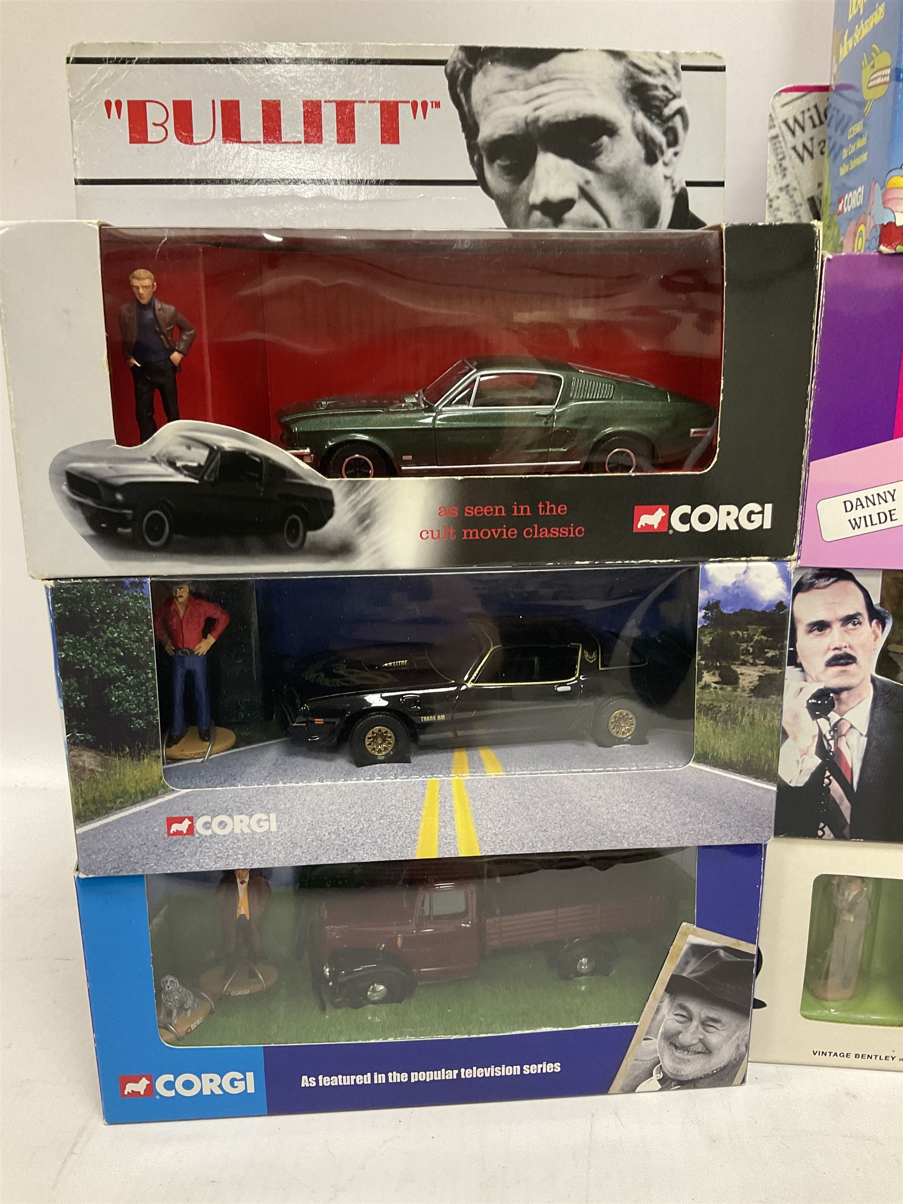 Corgi - sixteen TV/Film related die-cast models including Fawlty Towers, Bullitt, Beatles, Buster, Mr. Bean, Some Mothers,  Monkees, Ballykissangel, Heartbeat, The Avengers, Smokey & The Bandit etc; all boxed (16)