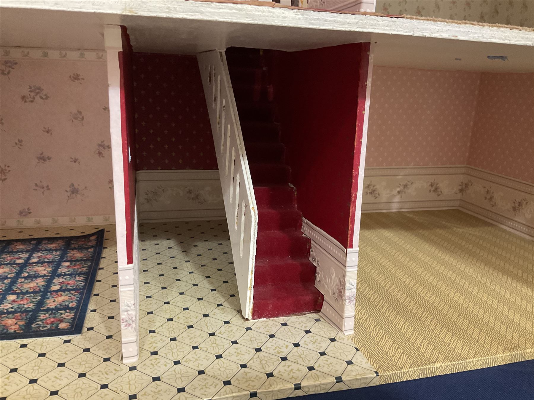 Modern scratch-built Palladian style wooden dolls  house as a 19th century double fronted two-storey property with simulated brick and stone walls under a removable simulated slate hipped roof; the triple hinged front elevation opening to reveal six rooms with central hall, stairs and landing L94cm H56cm D40cm