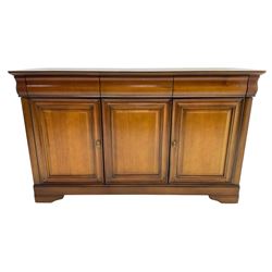 Cherry wood sideboard, fitted with three cushion drawers over three panelled cupboard doors, on bracket feet