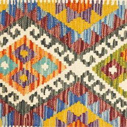 Afghan Chobi flatweave kilim and an Afghan Chobi flatweave kilim runner, with a repeating stepped diamond medallion design in ivory, green, rust, teal, purple, and indigo, framed by chevron and geometric borders, 148x53cm & 129x80cm, (2)