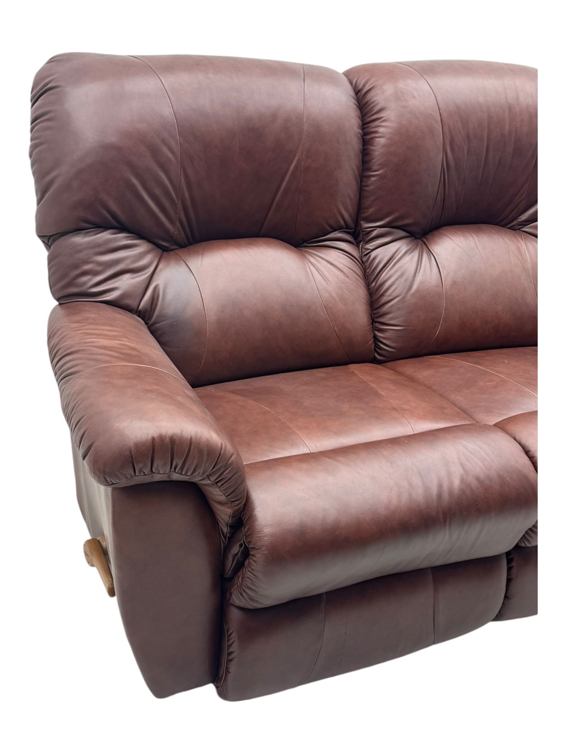 La-Z-Boy - manual reclining three piece suite - two seater sofa (W165cm, H105cm); and two armchairs (W98cm), upholstered in brown leatherette