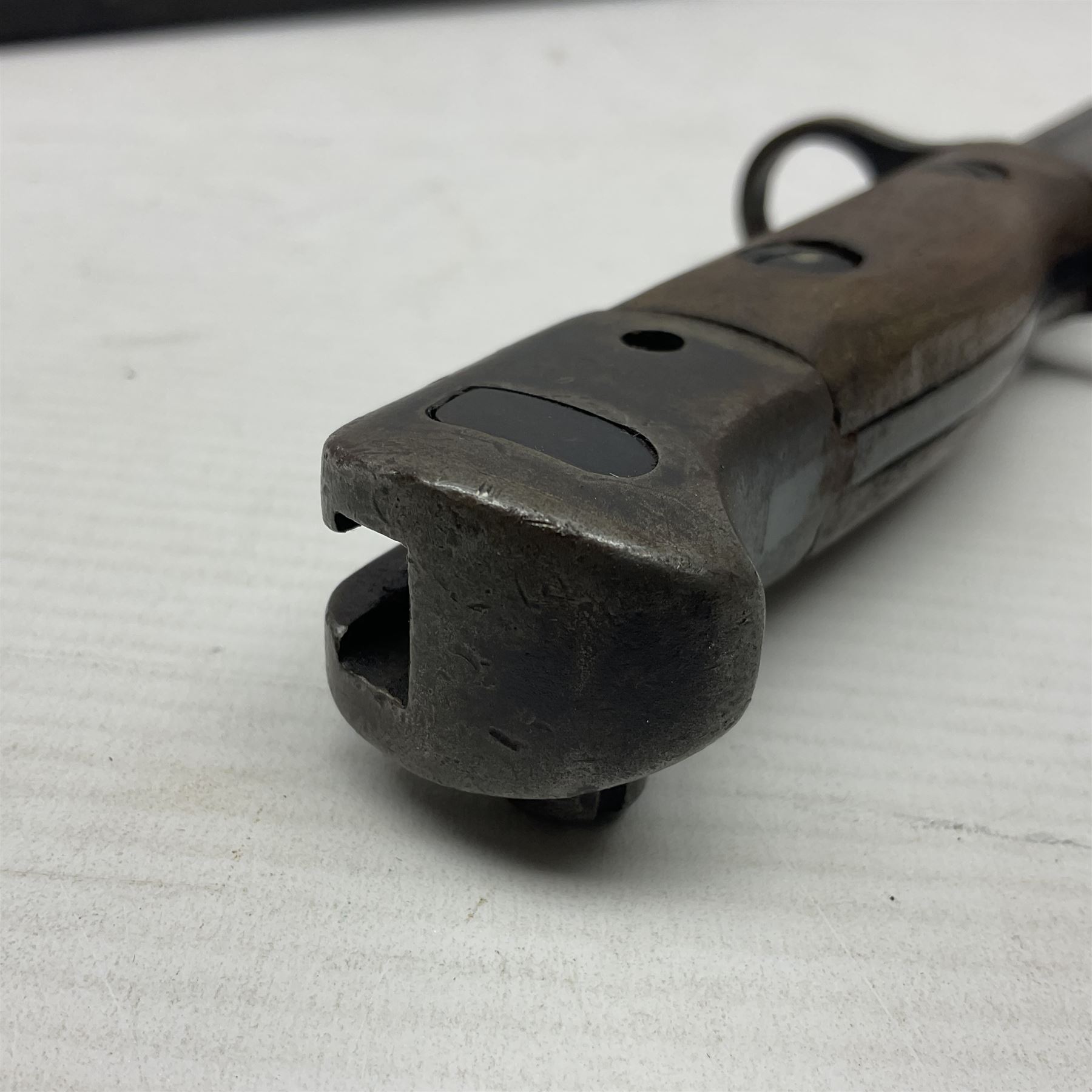 WWI British 1907 pattern bayonet, the 43cm fullered blade by Wilkinson with various marks to the ricasso; in leather covered scabbard numbered 294 to the throat and stamped M/58 L58.5cm overall