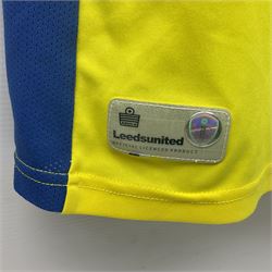 Leeds United football club - thirteen replica shirts including home and away