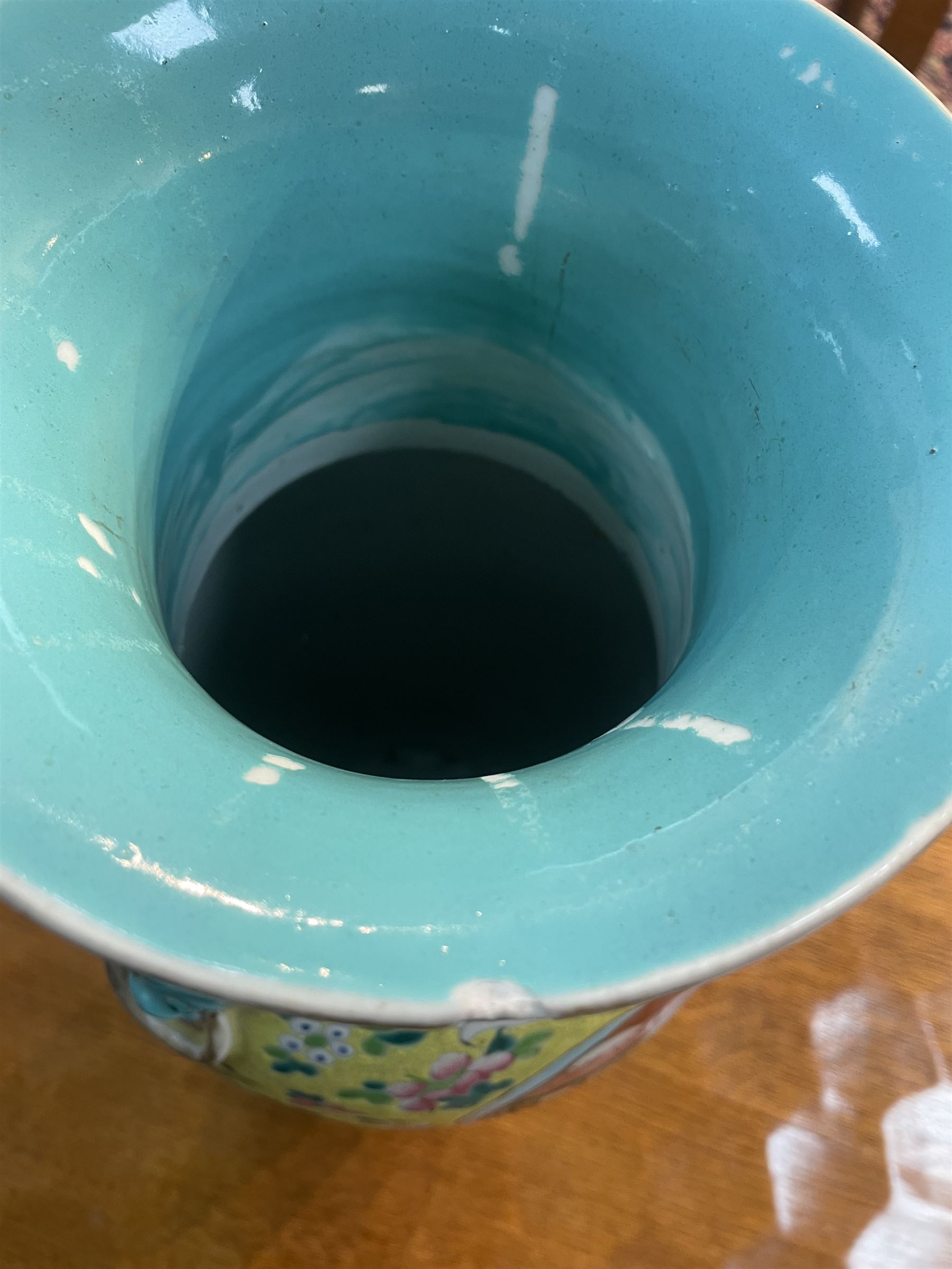 19th century Chinese famille rose yellow ground porcelain vase, of baluster form with twin applied mask ring handles, the body decorated with two shaped reserves mounted with dragon heads, depicting warriors at battle and at court, the neck with two smaller conforming figural reserves, upon a yellow ground decorated with exotic birds amidst scrolling blossom, H45.cm