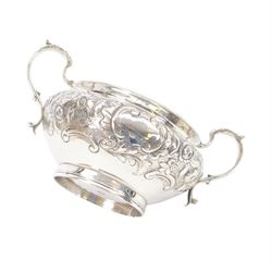 William IV silver twin handled sugar bowl, embossed with flowers and scrolling decoration with acanthus capped twin handles, hallmarked J Wrangham & William Moulson, London 1837, H10cm, D14cm