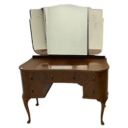 Mid-20th century kidney shaped mahogany dressing table, raised triple mirror back, fitted with four drawers, on cabriole supports