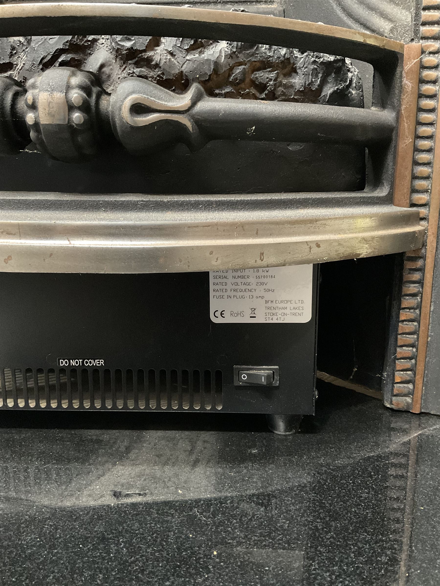 Aurora Dorchester Black Fire suite - granite style surround with cast iron insert, electric fire with remote and black hearth