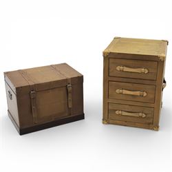 Contemporary leather trunk with handles and bedside table of similar design, three drawers...